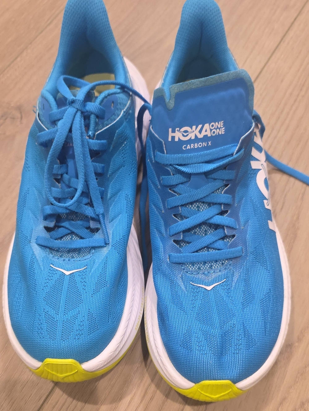 Hoka Carbon X Blue Running Shoes with Yellow Accents